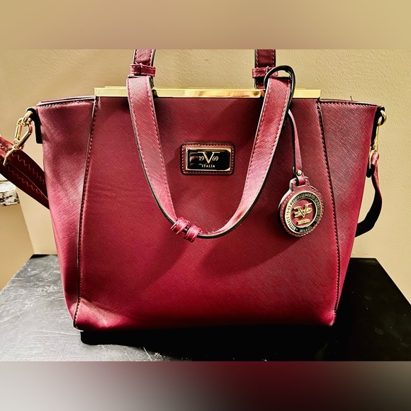 Versace Handbags - Versace 19v69 burgundy hand bag. Gold detailing. Brown lining. Like new.